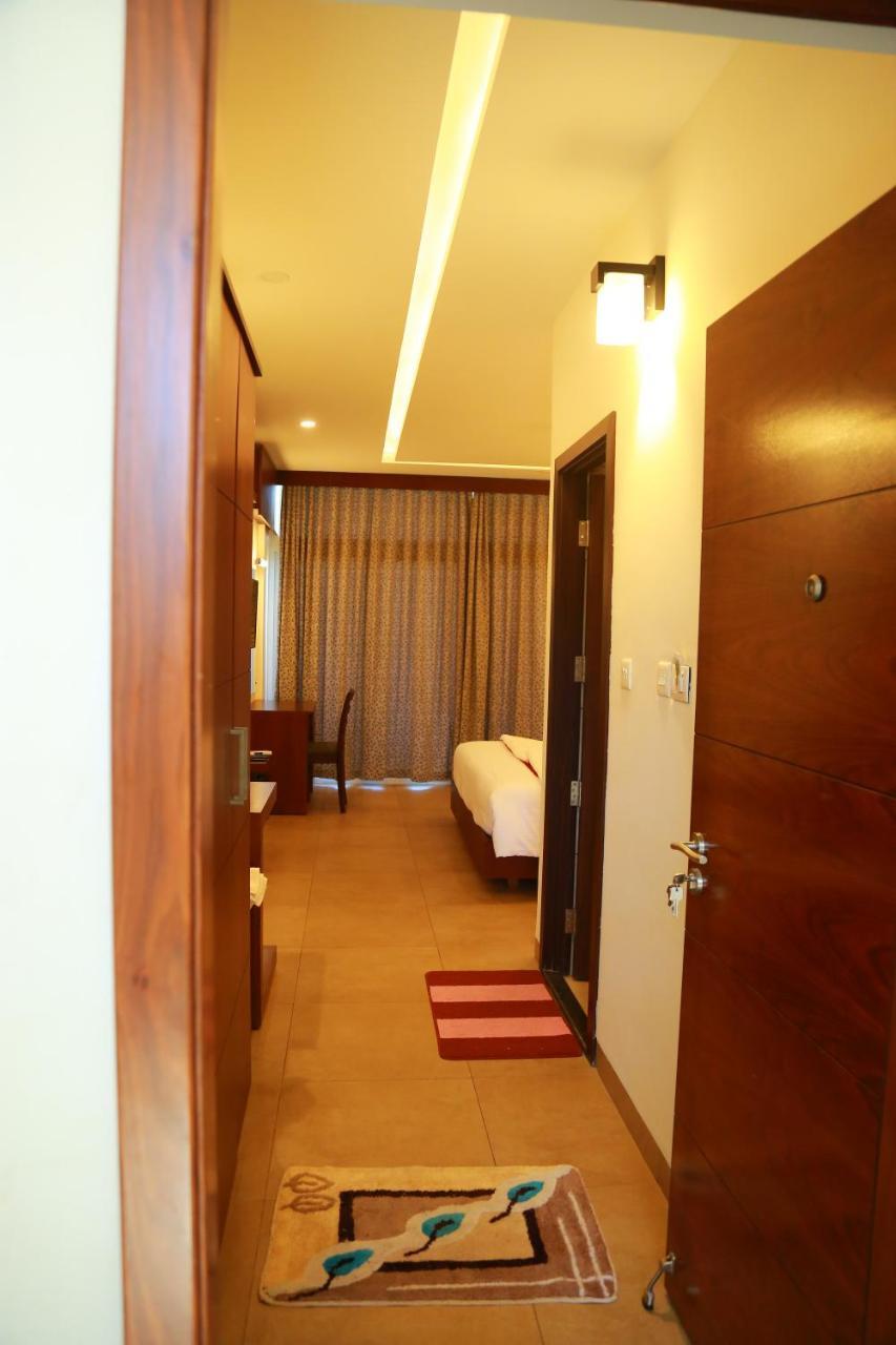 Hotel Palmtree Leaf, Munnar Exterior foto